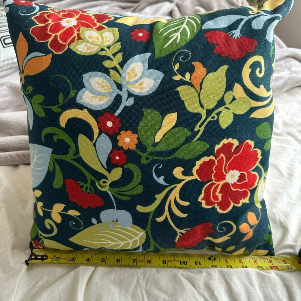 Floral pillow with design on both sides